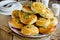 Homemade dinner buns stuffed with minced meat and cheese. Round meat patties from yeast dough for snack