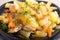 Homemade dish of slices of stewed potatoes, chicken, carrot and