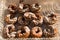 Homemade donuts on plastic tray with icing sugar on top