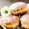 Homemade donuts whit white flower