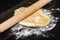 Homemade dough being formed into pasta