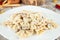 Homemade farfalle pasta with mushroom creamy sauce