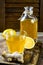 Homemade fermented raw ginger lemon kombucha tea. Healthy natural probiotic flavored drink. Copy space.