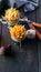 Homemade French Fries, Onion, Garlic, Fork and Spoon on Dark Wooden Table. Vertical food banner