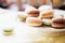 Homemade French Macaroons on the Plate, Pistachio, Coffee and Va