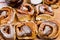 Homemade fresh baked yeast buns with plum jam. Sprinkled with icing sugar.