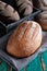 Homemade fresh bread on the dark table