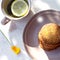 Homemade freshly baked sesame cookies and a mug of tea with lemons. Top view. Keto gluten-free pastries