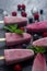 Homemade frozen fruit popsicles with fresh natural raspberry and blueberry, tasty ice pops, summer food concept, selective focus