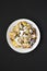 Homemade german Kaiserschmarrn pancake on a black background, top view. Flat lay, overhead, from above. Closeup