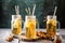 homemade ginger ale in mason jars with reusable straws