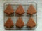 Homemade gingerbread Christmas cookies cooling on metal rack