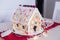 Homemade gingerbread Christmas house, Handmade Xmas dessert , Holidays concept