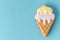 Homemade gingerbread cookie in the shape of ice cream with pastel colors icing. Vintage stylish birthday pastry background. Free