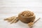 Homemade gluten free granola bars on wooden background.