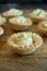 Homemade Goat Cheese Tarts on a Wood Board