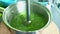 Homemade green broccoli cream soup recipe using hand blender.