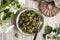 Homemade green nettle pasta with fried spring morel mushrooms