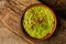 Homemade guacamole sauce in a rustic bowl