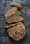 Homemade healthy bread on a dark background, top view. Gluten free. Healthy food diet concept