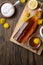 Homemade healthy dandelion syrup in a glass bottle, decorated with fresh flowers