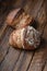 Homemade hearth bread on a wooden table.