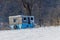 Homemade hunting blind during winter with snow