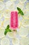 Homemade Ice pops on fruity background