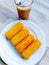 homemade indonesian risoles and cappucino