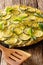 Homemade Italian savory tart scarpaccia from zucchini with flowe