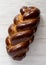 Homemade jewish challah bread on a white wooden background, top view. Overhead, from above, flat lay. Close-up
