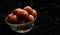 Homemade Kerala snack unniyappam in dark background