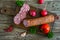 Homemade kraft sausage salami, sliced on a wooden board