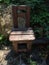 Homemade large chair made of wood top view in forest