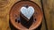 Homemade lavender ice cream in in the shape of a heart in rural clay plate decoration blueberry. Creamy vegan lavender