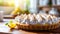 Homemade lemon meringue pie and lemon desserts in a cozy kitchen with blurred background