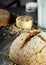 Homemade loaf of freshly baked green buckwheat bread and organic buckwheat milk. Ceramic, linen napkin. Harmless,wellness, gluten