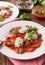 Homemade malfatti with tomato sauce