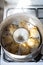 Homemade manti dumpling are cooking in steamer