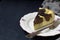 Homemade marble cheesecake with cream cheese, chocolate and tea matcha on a dark background. Copy space. Photographing with natura