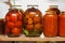 Homemade marinated tomato and sauce standing on a shelf