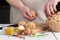 Homemade meatballs with cheese, garlic and black pepper on the wooden chopping board