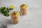 Homemade Mexican Corn Elote Esquites in Cups, side view. Copy space