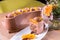 Homemade milk chocolate and chestnuts cake - milk chocolate mousse, pineapple marmalade, crispy base with hazelnuts and