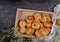 Homemade mini bagels on wooden tray