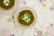 Homemade mini spinach and ricotta tarts on a white decorative na