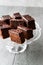 Homemade Moist Chocolate Sponge Cake Brownie Pieces in Vintage Glass Dessert Stand.