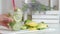 Homemade mojito or lemonade. A woman\\\'s hand takes a plastic cup with a cool summer drink