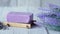 Homemade natural soap bar and lavender flower on table