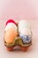 Homemade naturally dyed Easter eggs in vintage ceramic holder